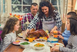 a-family-sitting-down-for-a-holiday-meal